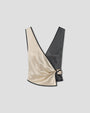 Beige and dark green satin wrap-style top with a deep V neckline and side tie detail.