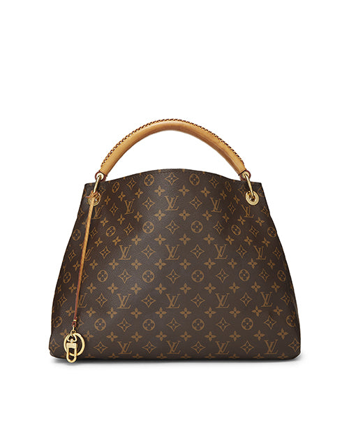 An elegant Louis Vuitton handbag featuring the classic brown LV monogram canvas. The bag boasts a trapezoidal shape, complemented by tan leather trim and handles, and is adorned with gold-tone hardware.