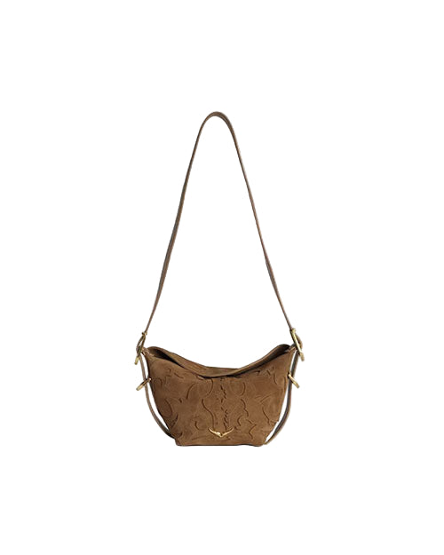 A brown suede shoulder bag with a long strap, featuring a textured pattern and gold-tone hardware accents.
