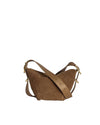 A brown suede handbag with a long, adjustable leather strap, featuring decorative stitching on the front and gold-tone hardware on the strap buckles.