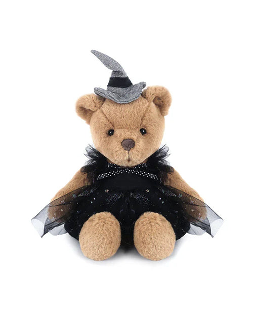 Teddy bear in a black dress and witch hat on a white background