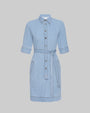 A light blue denim dress with mid arm short sleeves, a collar, and a front button closure with silver hardware. The dress features a waist tie detail and appears to be knee-length. 