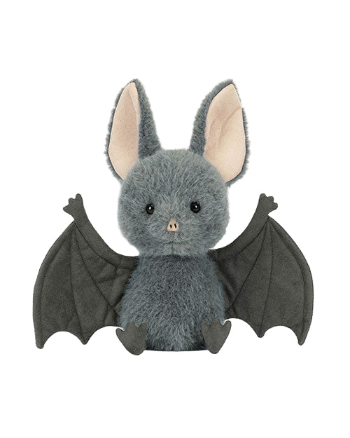 Plush bat toy with grey fur, large round black eyes, a small pink nose, light pink inner ears, dark grey outstretched wings, and visible feet.