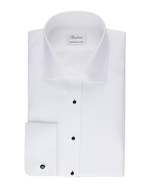 A white dress shirt with a spread collar, black buttoned front, and long sleeves featuring rounded cuffs. 
