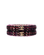 Chanel bangles with tweed pattern and gold-tone double 'C' logo. Flat and rigid design.