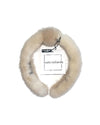 A ivory mink fur headband with a knot in the middle. The label has black text that reads “linda richards NEW YORK.” 