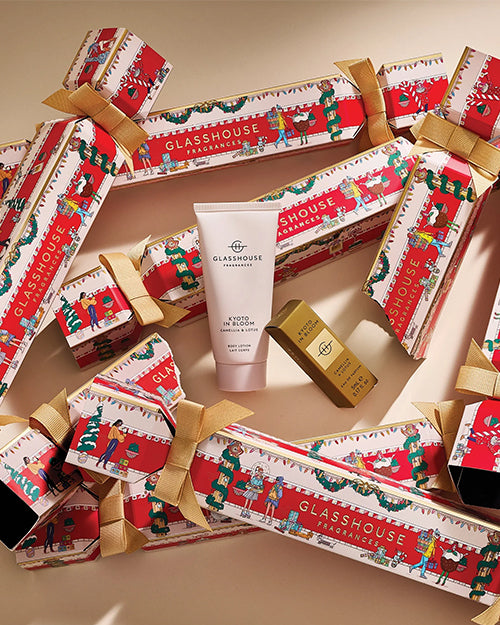 Glasshouse products with festive packaging on a beige background