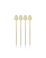 Four sleek, gold metal beverage stirrers are aligned vertically against a white background. Each stick has an ornate fan-shaped top, creating an elegant, modern look.