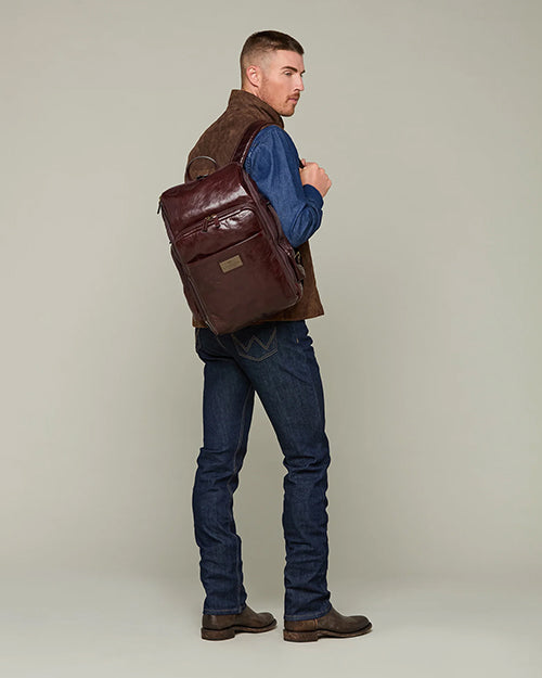 blue and brown leather backpack Lucchese