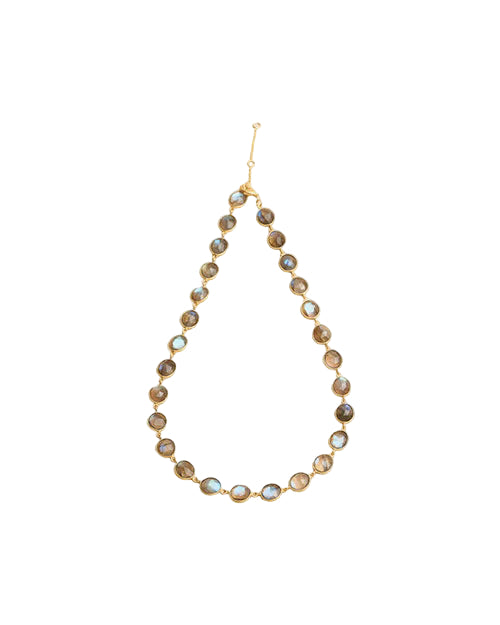 A necklace featuring evenly spaced round, iridescent stones set in gold-colored metal, connected by small links to form a complete loop. A lobster clasp closure is visible in the image.