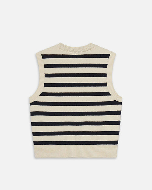 A backside view of a sleeveless knitted top with horizontal black- and cream-colored stripes. The top has a round neckline.