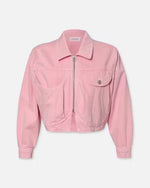 Pink denim jacket with silver zipper and button. Features classic collar, two heart-shaped chest pockets, and long sleeves. Cropped style ending at waistline. Label 'FRAME' visible on inside collar.