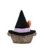 Plush toy with a fuzzy gray body wearing a black witch hat with a purple band and an orange feather, shown from the back.
