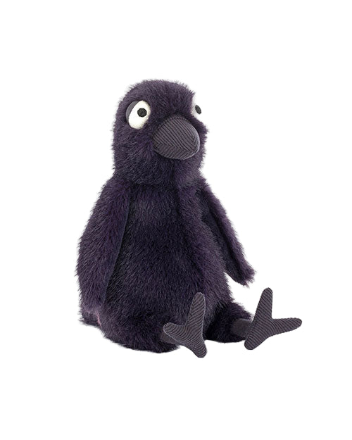 Plush toy bird with dark purple fur, large white eyes with black pupils, a textured beak, and legs stretched out in front.