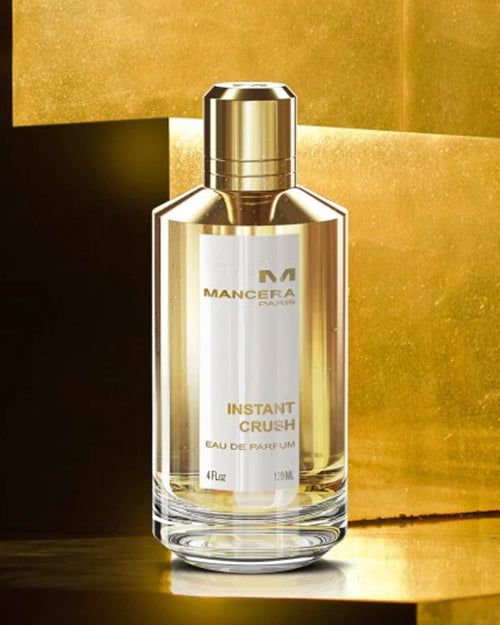 Mancera Instant Crush perfume bottle on a gold background