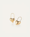 Two gold heart-shaped earrings 