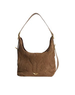 A brown suede handbag with a single shoulder strap, featuring an embossed pattern on the front and sides, and gold-tone hardware including strap buckles and a small decorative piece at the bottom center.
