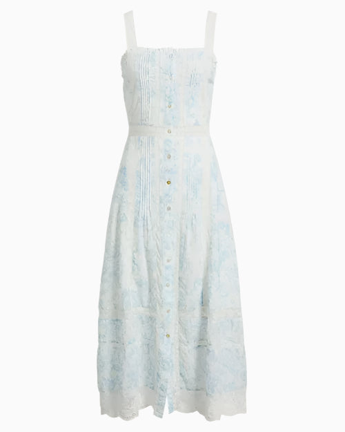 A complete image of a light blue and white dress with buttoning down the front and over the shoulder straps. The dress has lace detailing and a fitted bodice that flares out into an A-line skirt. 