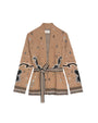 Brown cardigan with a belt, featuring black and white geometric and stylized patterns on the sleeves, hem, and waist. The cardigan has long sleeves, an open front, and a visible "ZADIG & VOLTAIRE" label at the neck.