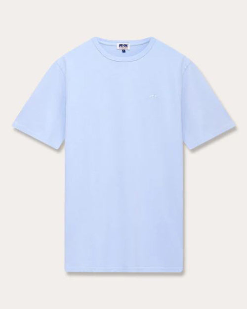 A plain light blue t-shirt against a solid background. The t-shirt features a round smooth neckline, short sleeves, and a small, barely visible white logo on the left chest area.