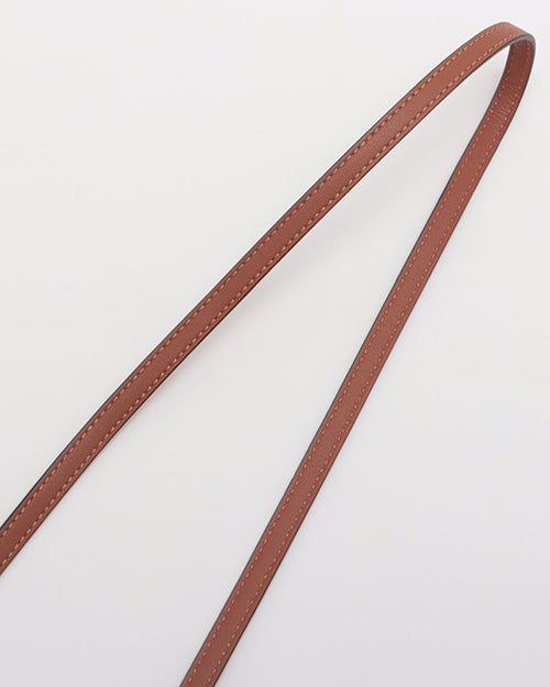 Brown leather strap.