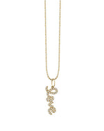 A gold chain necklace with a 'love' script pendant with pave diamonds. 