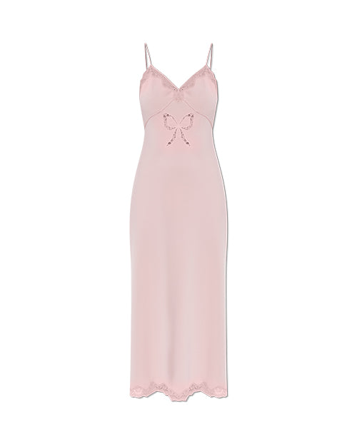 Pink slip dress with a lace bow on a white background