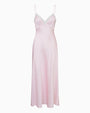 Pink satin dress with white polka dots on a white background