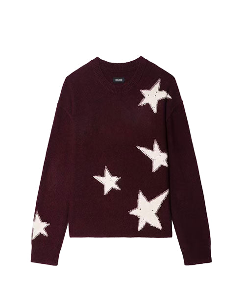 Maroon-colored sweater with five white star patterns—one on the upper right shoulder, three on the front, and one on the left sleeve. The sweater features a round neckline and long sleeves.