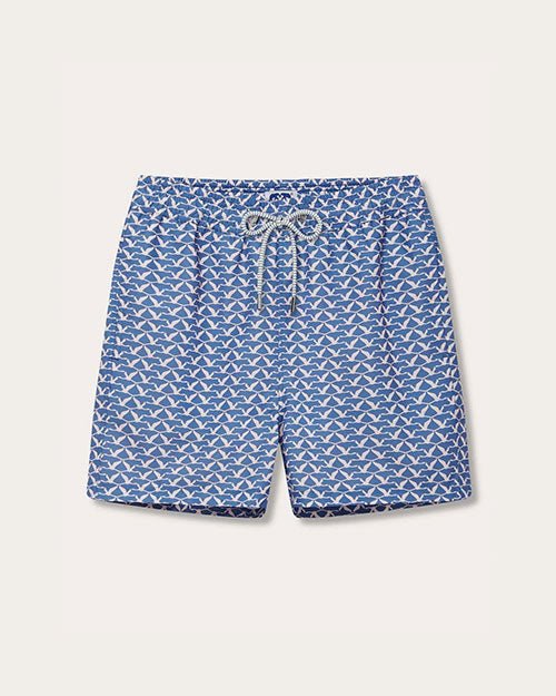 A pair of blue swim shorts with a light nude flamingo pattern throughout. The shorts have an elastic waistband with a drawstring for adjustment.