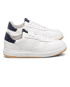 White sneakers with navy accents on a white background