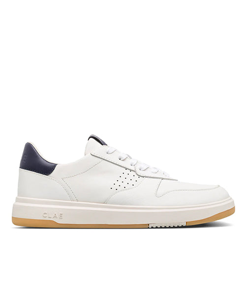 Side view of a white sneaker with a blue heel tab on a white background