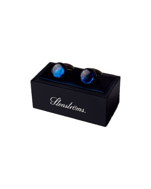 Blue cufflinks in a black Stenstroms box on a white background