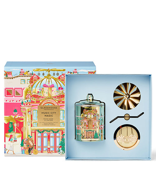 Decorative candle set with colorful packaging on a white background