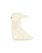 White plush toy with a soft, fluffy texture, black eyes, two small wings, and an elongated body tapering to a point at the bottom, resembling a ghost.