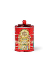 Red decorativeglass candle with intricate design on a white background