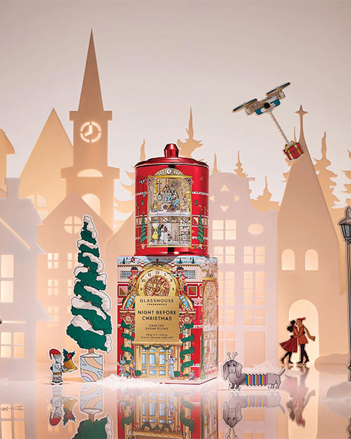 Decorative Christmas candle with cityscape background
