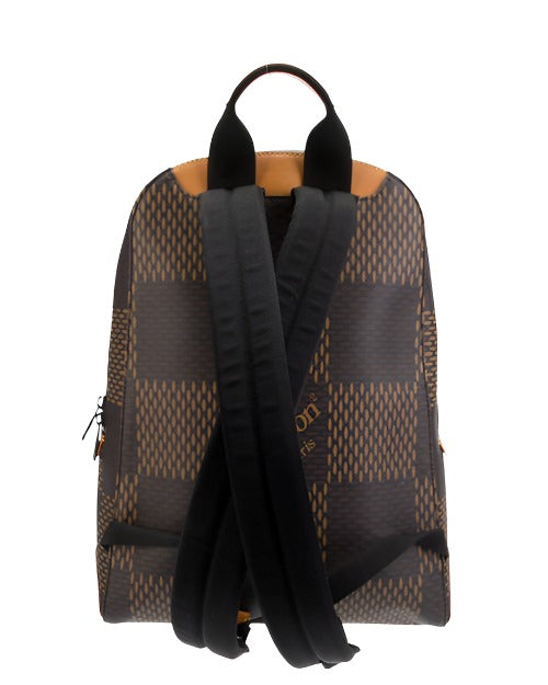 The backview of a backpack with a distinctive checkered pattern in shades of brown. The backpack has black shoulder straps, a top handle with what appears to be leather detailing, and a visible brand logo on the lower part of the straps. The zippers have black tabs, and the overall design suggests a stylish yet functional accessory.
