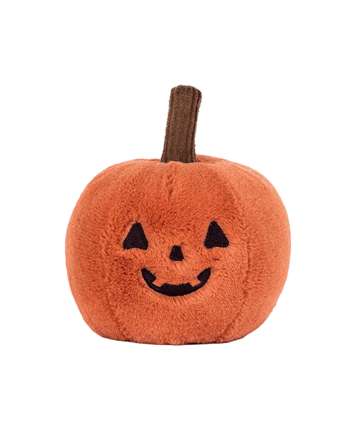 Orange plush pumpkin toy with a brown stem, black triangular eyes, a small triangular nose, and a curved jack-o'-lantern smile.