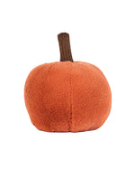 Soft, fuzzy orange plush pumpkin toy with a brown stem.