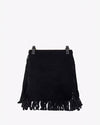 A full backside view of a black handbag with tassels at the bottom, sitting in front of a white background.