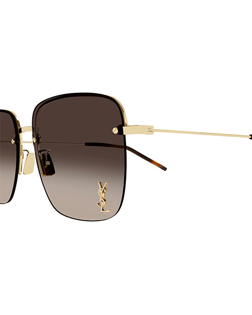 Close-up of square frame sunglasses with gold-toned metal frame, tortoiseshell tips and brown lenses. On the bottom left lens is an embossed logo of ‘YSL'.