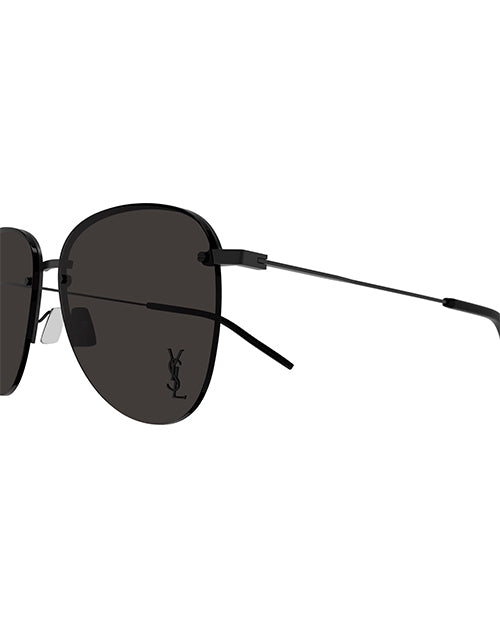 Close-up of of black aviator-style sunglasses with a thin metal frame and black lenses. The left lens features a small, stylized 'YSL' logo in the bottom corner. 