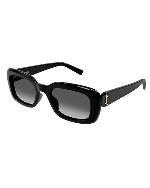 A pair of black sunglasses with a thick frame and rectangular lenses. YSL logo in gold on the side of the temple. 