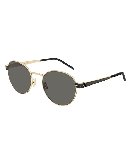 Round-framed sunglasses with a gold-tone metal frame. The lenses are grey and the temples are black, thin and there’s a small gold logo.