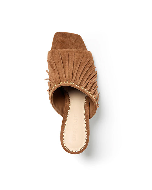 Brown suede sandal with fringe and gold accents, viewed from above.