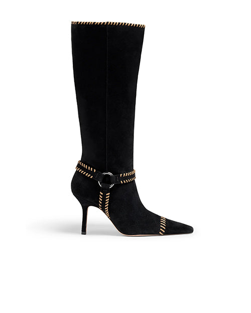 Black knee-high boot with a pointed toe, thin high heel, and decorative contrasting stitching along the top edge, ankle strap, and toe area, featuring a small buckle detail.