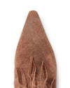 Top view of a brown suede pointed-toe boot with visible texture and decorative fringe detail near the toe area.