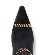Black pointed-toe boot with brown stitching on a white background