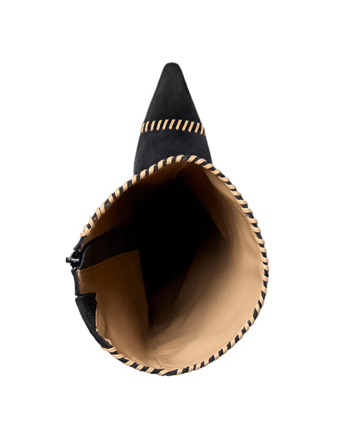 top view of a boot. You can see the pointed toe, tan interior lining, and black exterior with decorative stitching around the opening